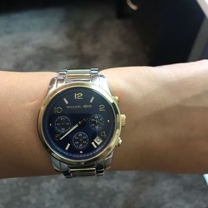 Michael Kors two tone watch with navy blue face